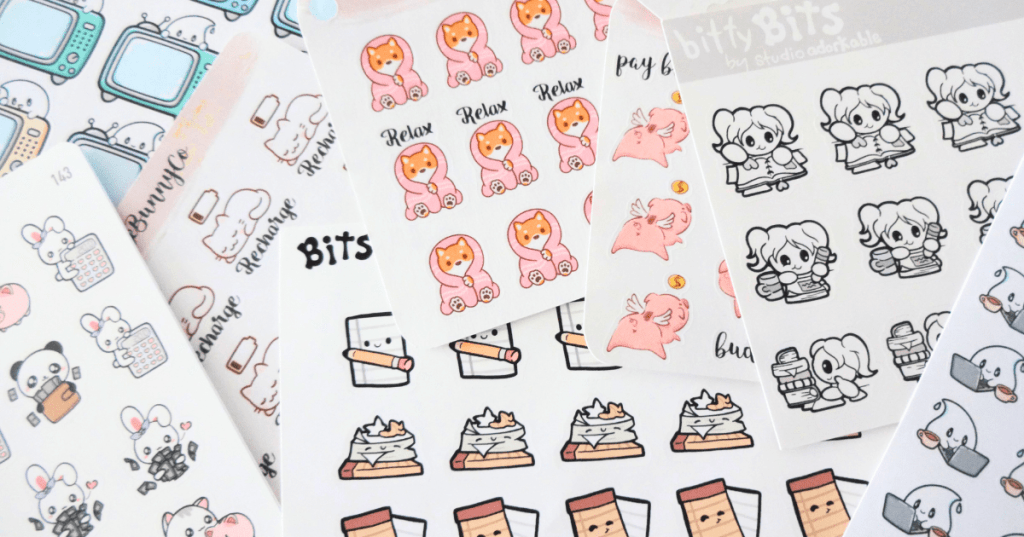 Colorful flatlay of stickers depicting tasks such as budgeting and planning.