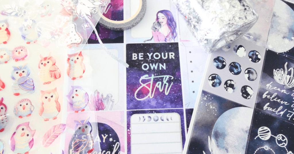 Shining flatlay of metallic and sparkling stickers.