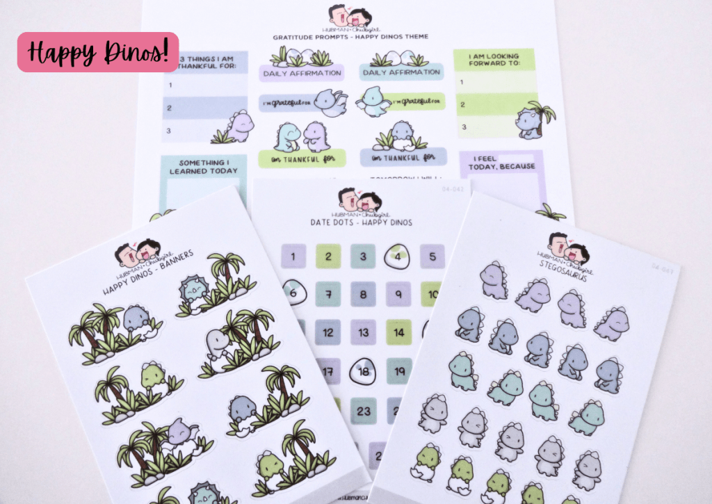 A flatlay of four various sticker sheets from the Happy Dinos collection.