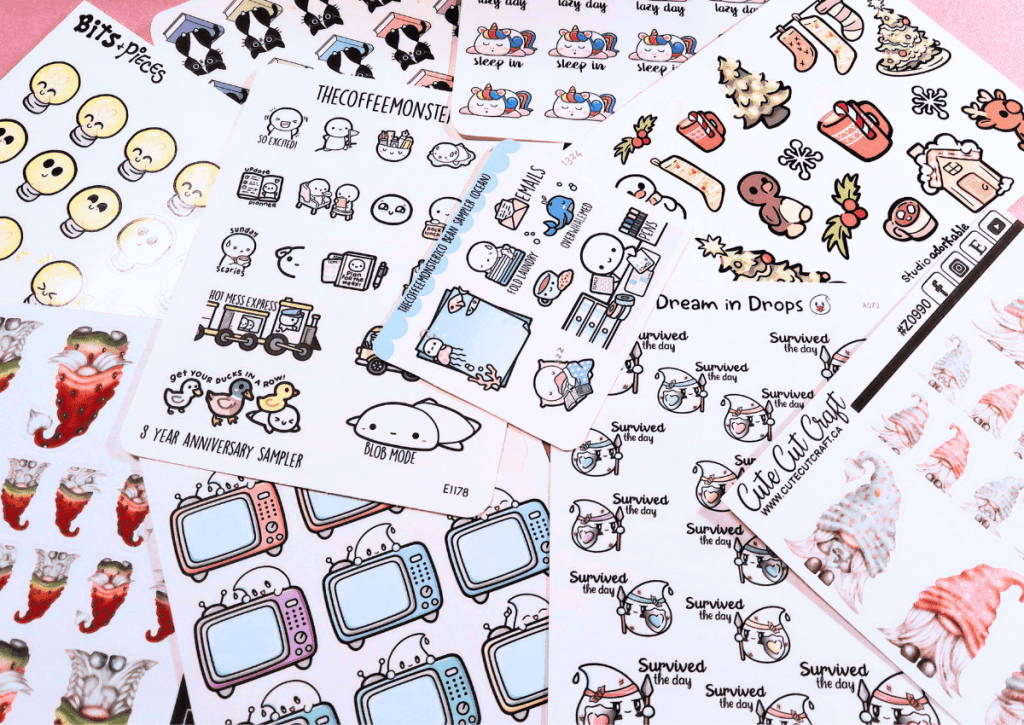 A flatlay of numerous sheets of paper stickers to showcase the wide range of designs and paper types available.