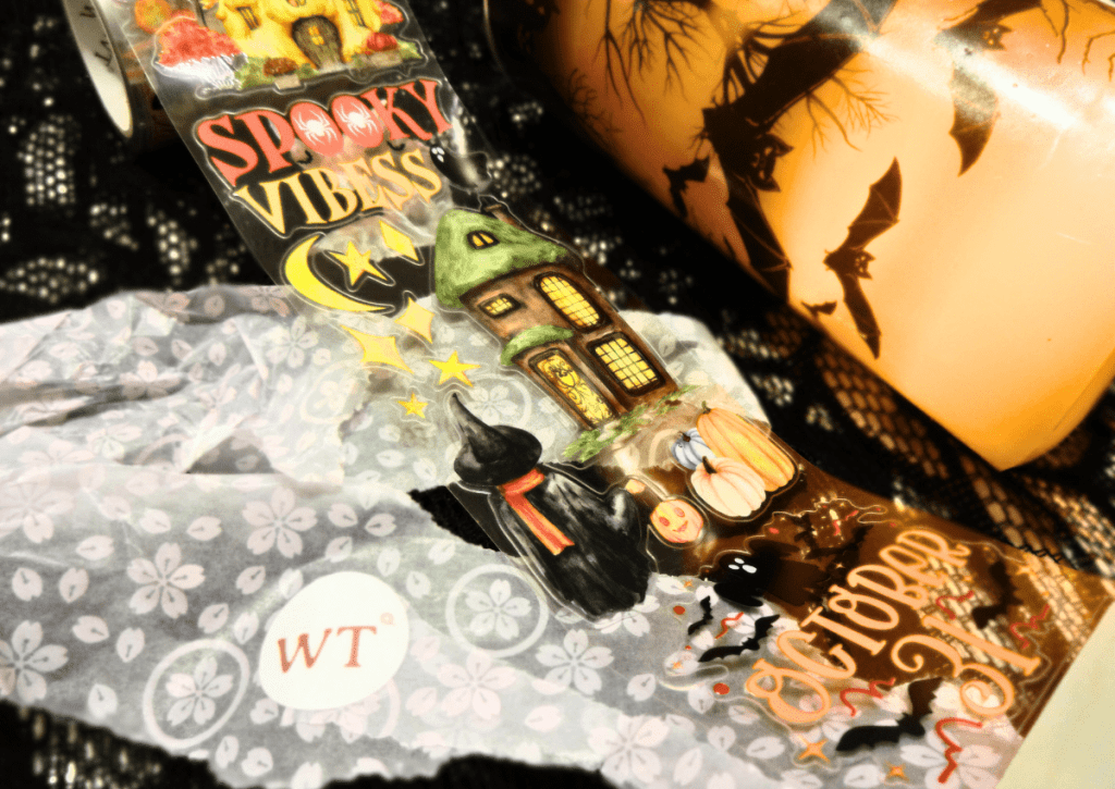 An unfurled stretch of the Haunted Harvest sticker roll showing the variety of Halloween stickers. 