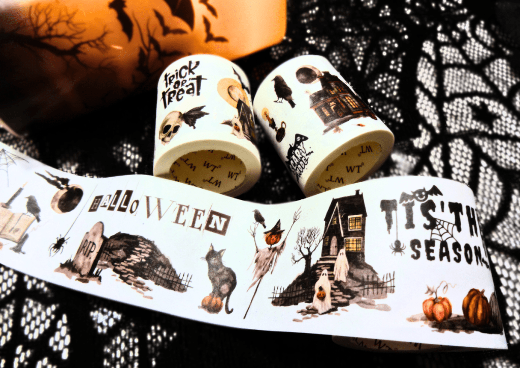 The three rolls from the Haunted House sticker tape set with one roll unfurled to show the variety of spooky stickers.