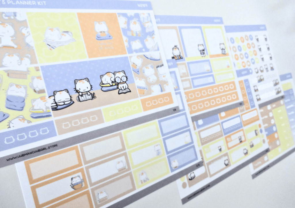 Side picture of the six pages of planner kit stickers included in the Cozy Cat box set.