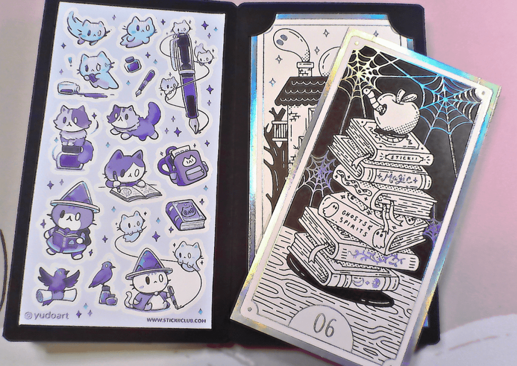 A picture showing how behind every tarot card there's a sticker sheet.