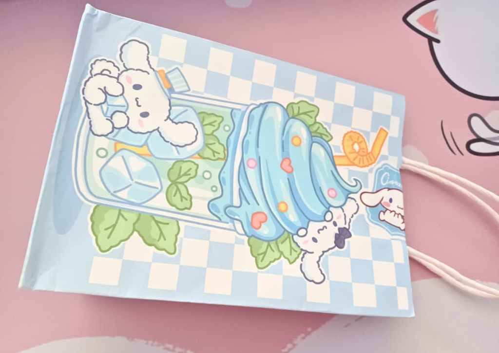 A paper bag with a Cinnamoroll design on it.