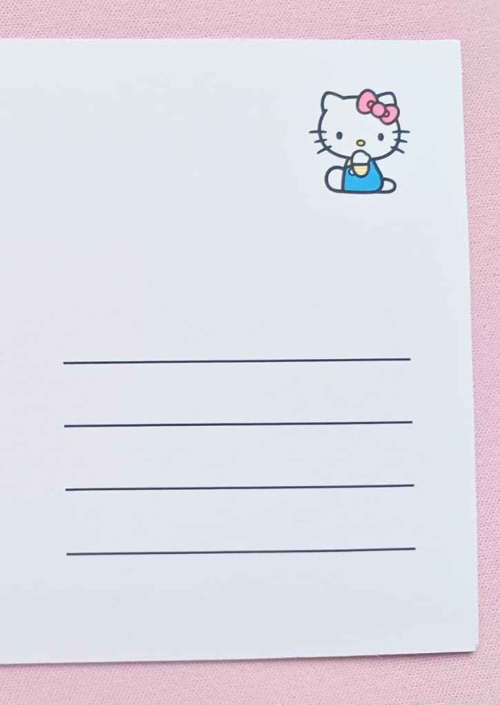 Postcard back with a cute Hello Kitty design in the corner