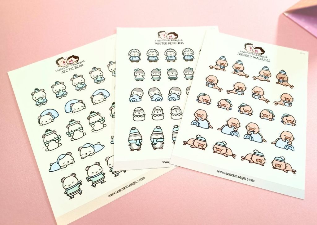 Three sticker sheets featuring cute arctic animals such as polar bears, penguins and walruses.
