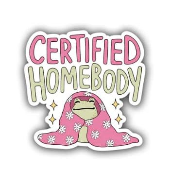 A hand drawn sticker of a cute frog wrapped in a pink blanket and the words "Certified homebody"