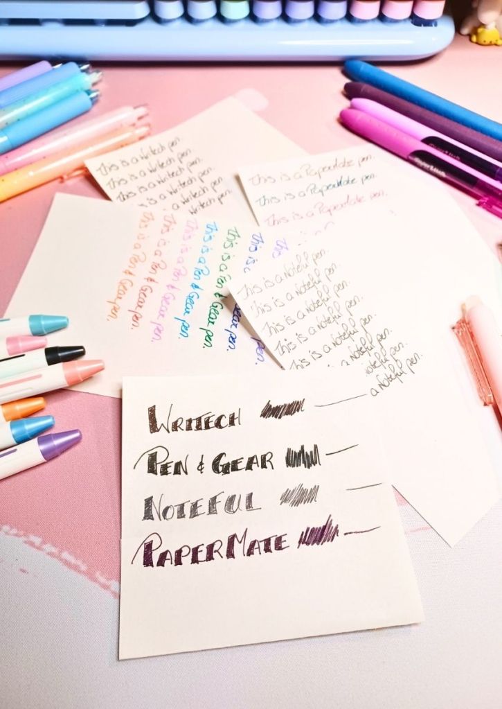 Many sheets with writing tests on them, surrounded by pens of various shapes, colors and designs.