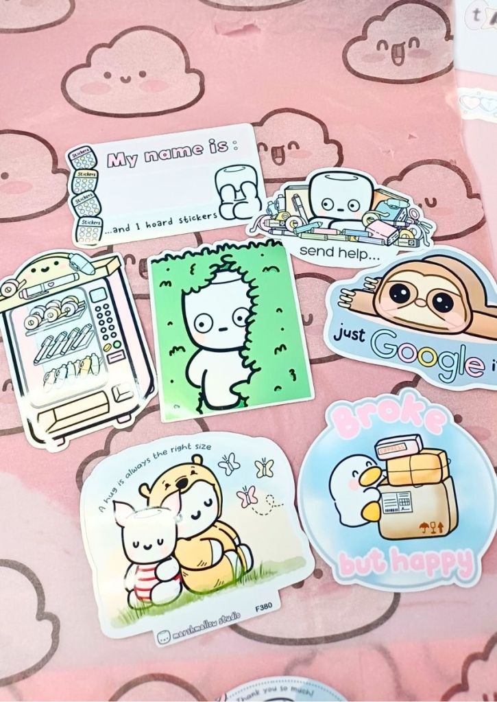 Various die-cut vinyl stickers with cute or funny designs.
