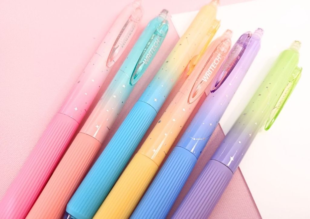 Six pens in pastel gradient colors with a starry design.