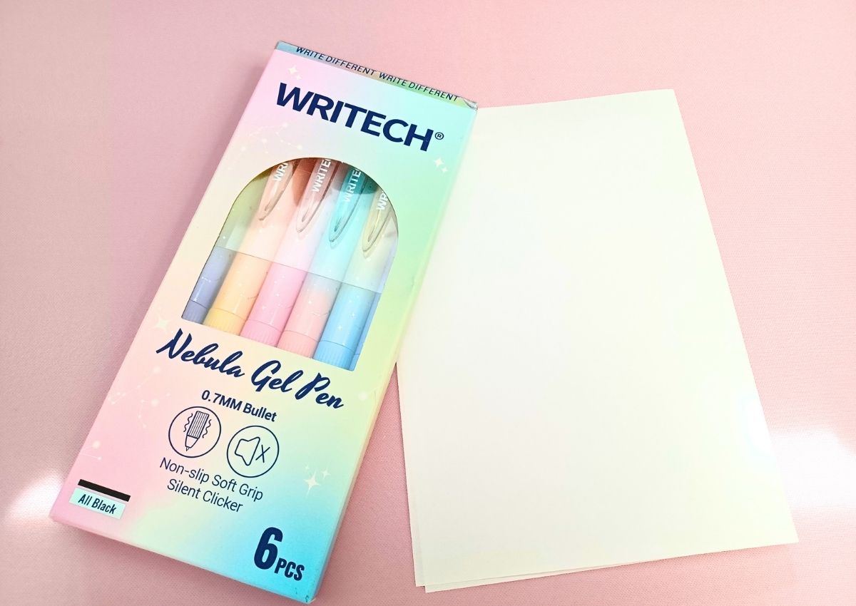 Six colorful pens in a pastel gradients box with starry designs.