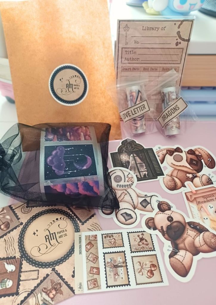A variety of vinyl stickers, washi tapes and notepads with a vintage, witchy-brown feel.