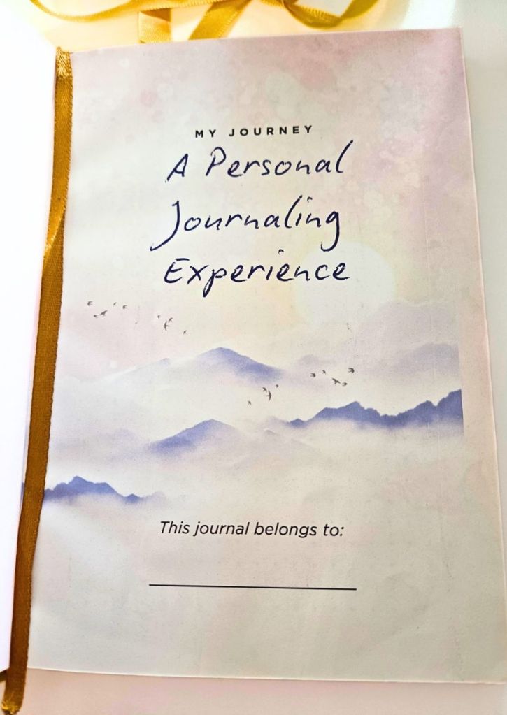 Journal title page reading My Journey: A Personal Journaling Experience, with an illustration of mountains and a line for the owners name.